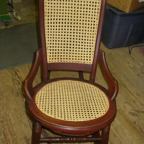 Vintage rocker with hand caned seat & back