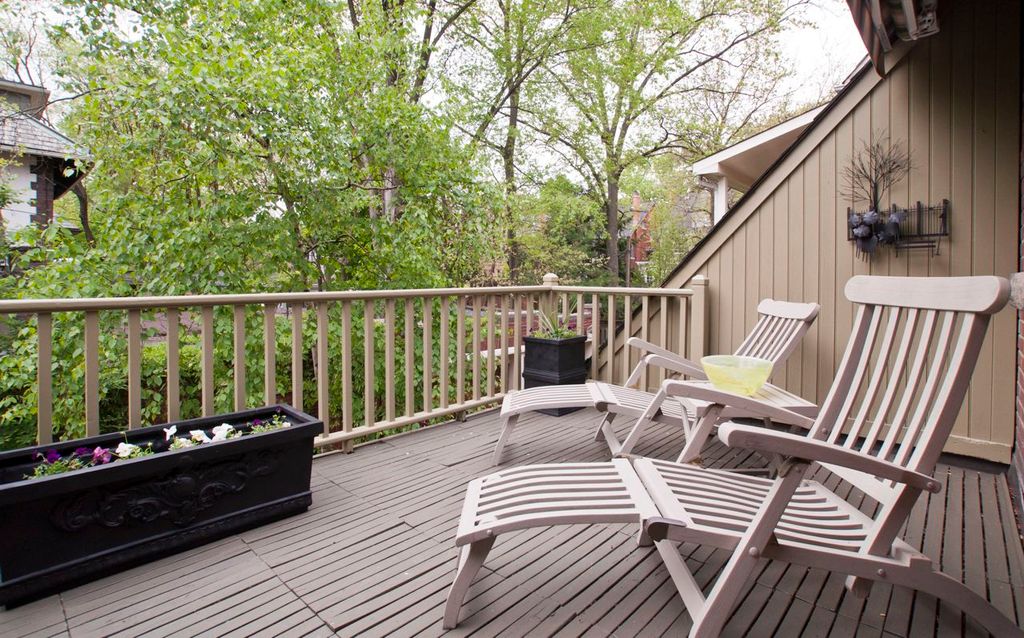 Exterior of same property; we restained deck, furn