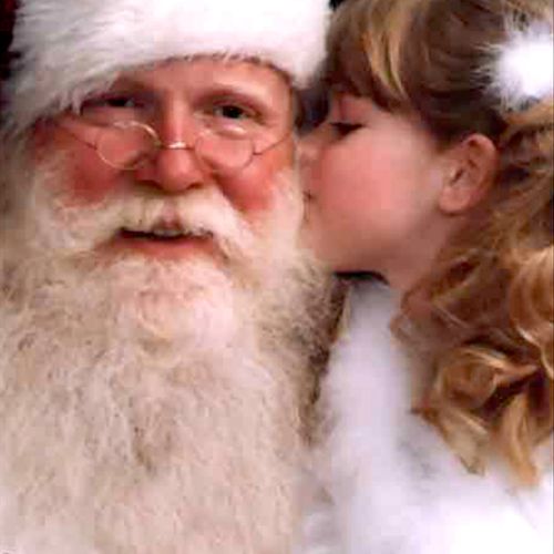 Santa and a young admirer, photograph by Madearis 