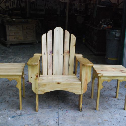 Lawn chairs and tables in many species of woods an