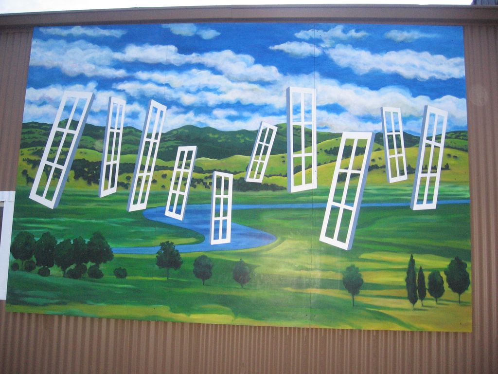 Mural on the side of the building by SF artist Car