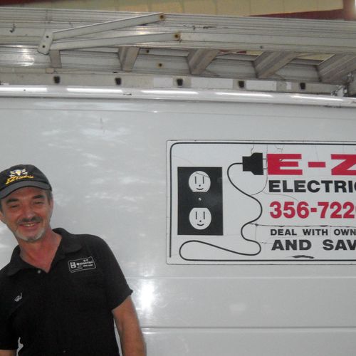 Ed in front of his electrical truck.