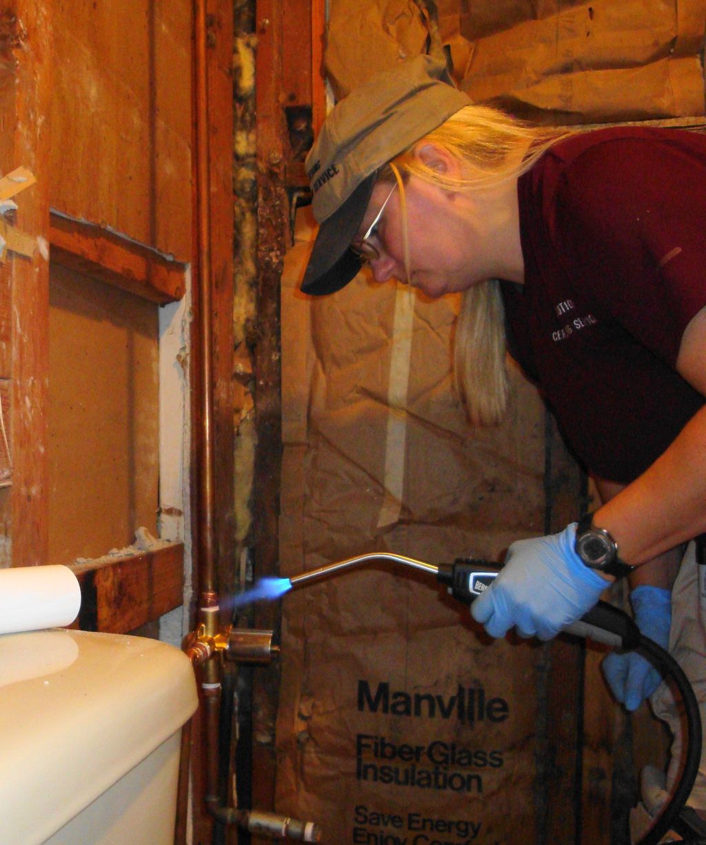 Me installing a new shower control valve as part o