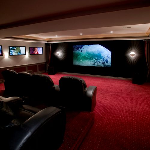Home Theater with 3 52 inch LCD TV's