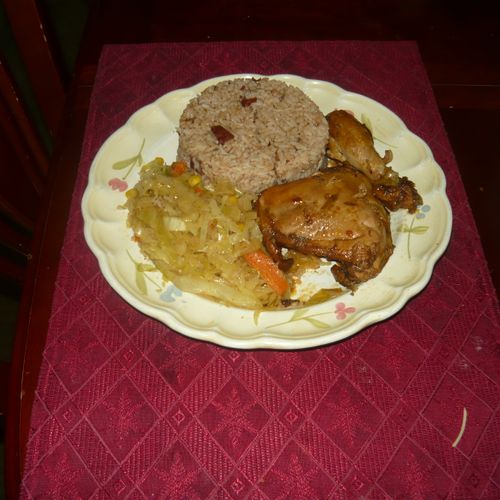 brown stew chicken rice n beans n steamed veg