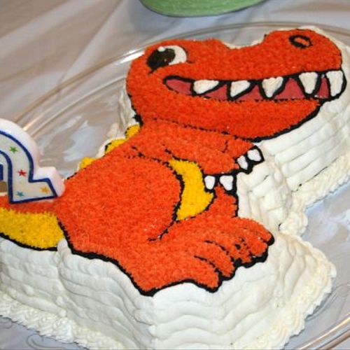 Dinosaur birthday cake using a Wilton shaped chara