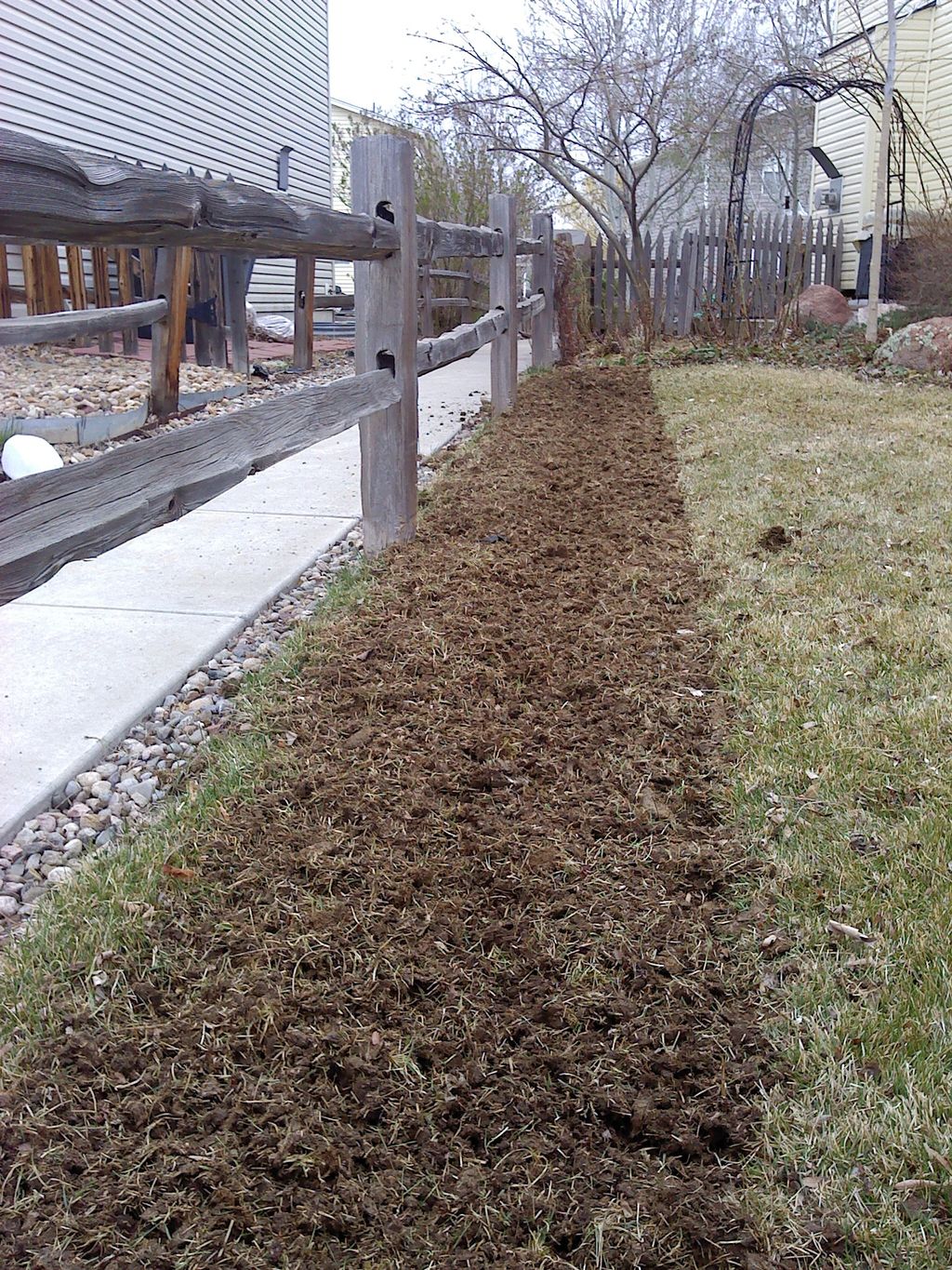 A third example of turning lawn area into garden b