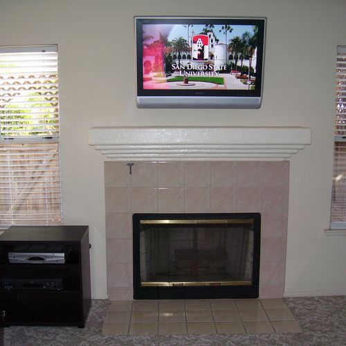 Mounted TV over fireplace