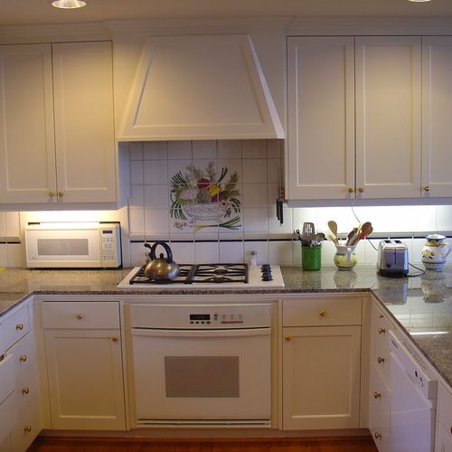 I hand-painted all of the cabinets in this kitchen