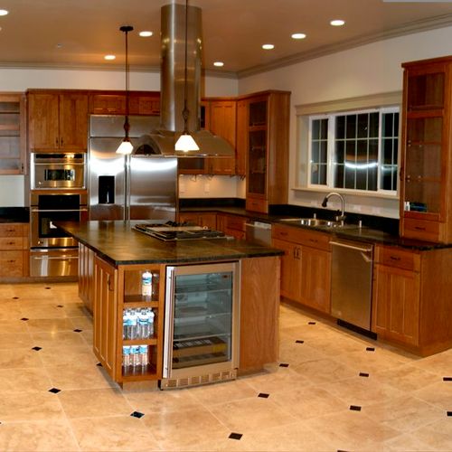 Kitchen remodel with ceramic tile and inserts.