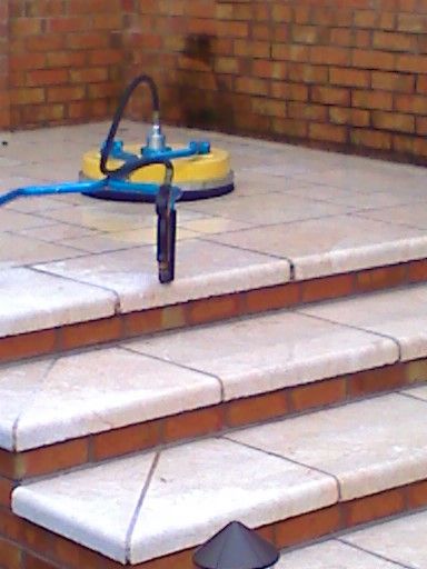 Travertine patio and brick cleaning.