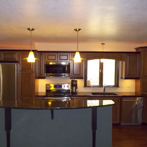 After - Newly remodeled kitchen with custom cabine