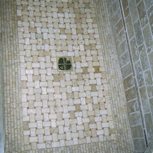 custom shower floor, mini brick mosaic surrounding