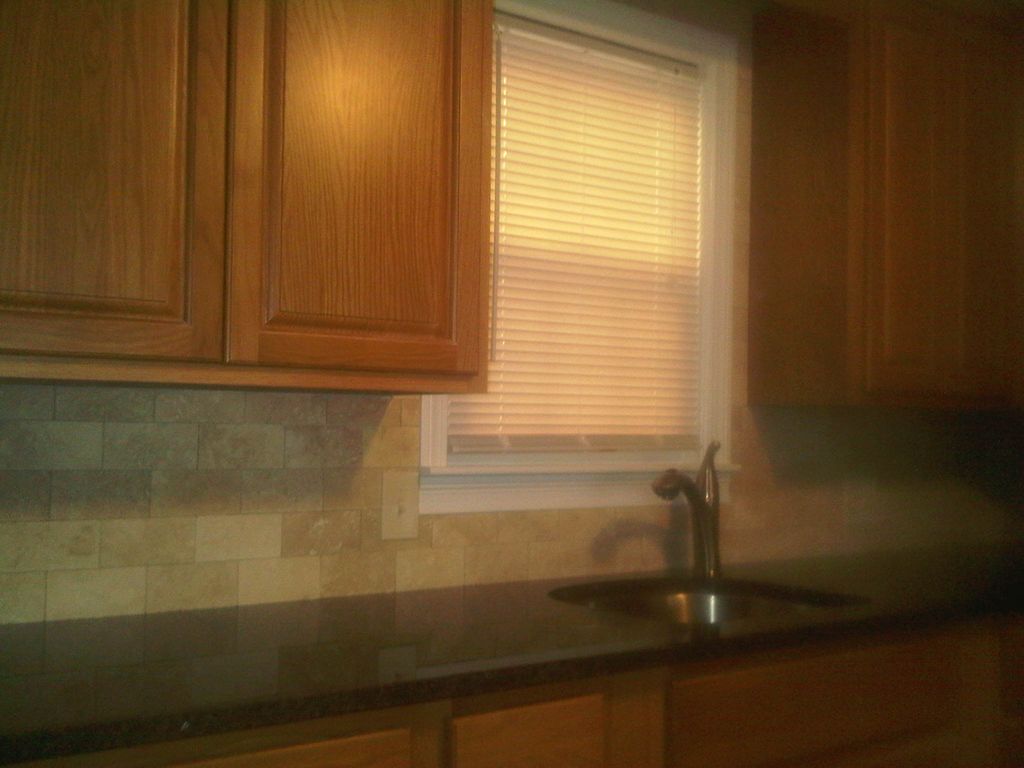 Backsplash tile after being grouted and sealed wit