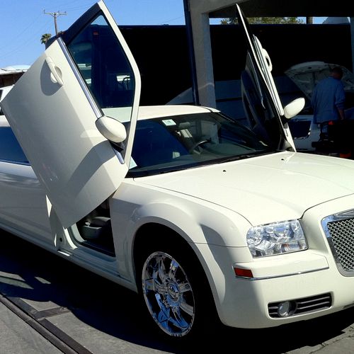 our 1 of a kind custom built white Chrysler 300 li