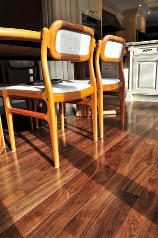 Solid wood or laminate flooring can add class, cle