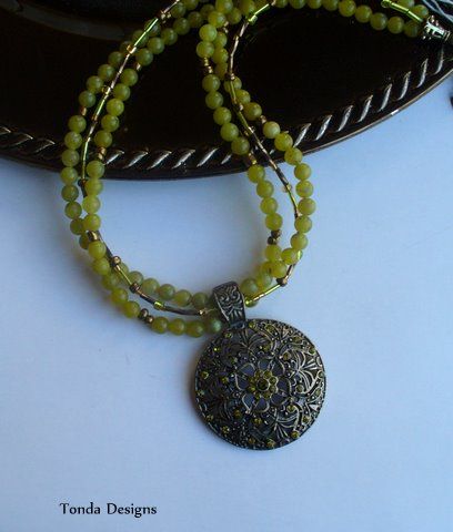 Russian round jade three strand with pendant- $37