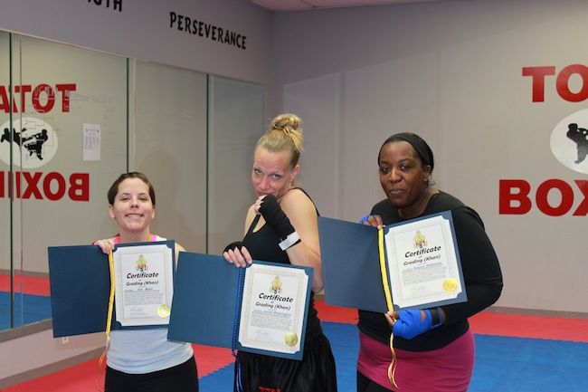 Students receiving their belt advancements