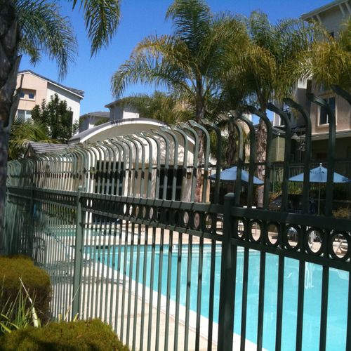 Bent pickets added to pool fence