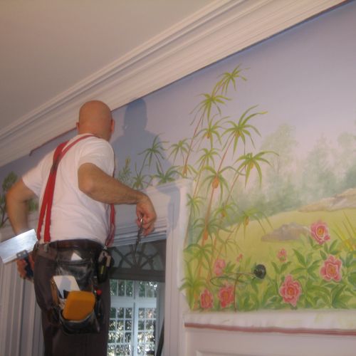 Installing Hand Painted Mural