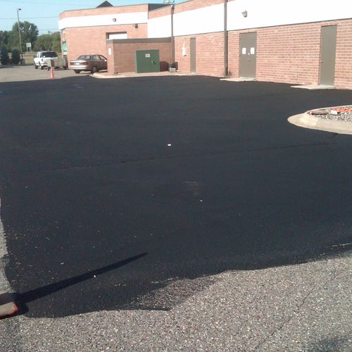 Just started Seal coating on this Strip mall in Bu