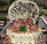 Shrimp cocktail in a ice carving of a clam shell