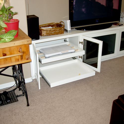 Custom built in entertainment console, with pull o