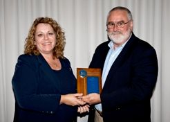Judy Benson accepting the 2010 Bob Owens Award fro