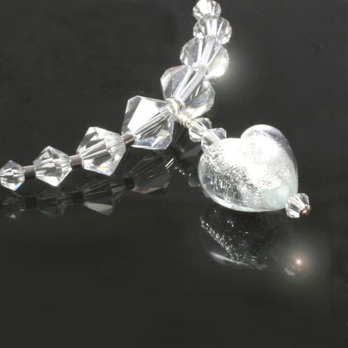 Transparent glass Murano heart encasing .925 silve