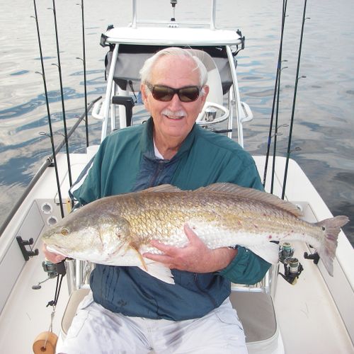 Fred D with a trophy redfish caught in the Indian 