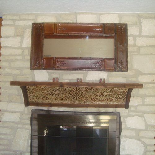 Installed fire place mantel and antique mirror.  S