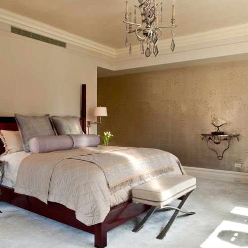 Beautiful Master Bedroom with hand made silver lea