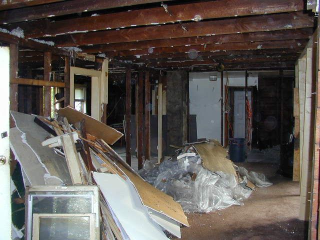 living room before American Handyman and maintenan