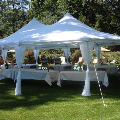Frame tent, tables, chairs and tablecloths