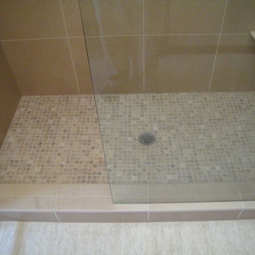 Custom shower pan and tile installation by DMJ ser