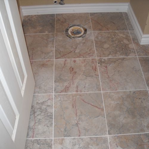 Marble floor in restroom.