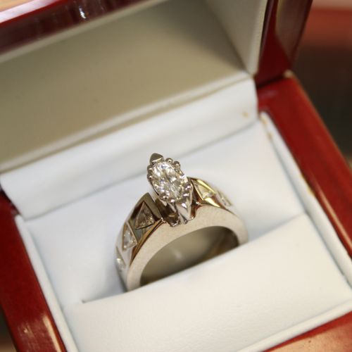 Custom design white gold ring. Appraised @ $7,945.