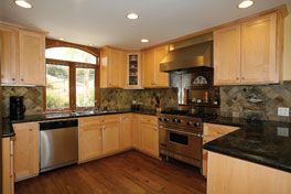 Granite Kitchen with Custom Wood Cabinetry Complet