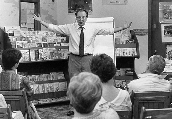 Claude at a bookstore signing event for "Running a