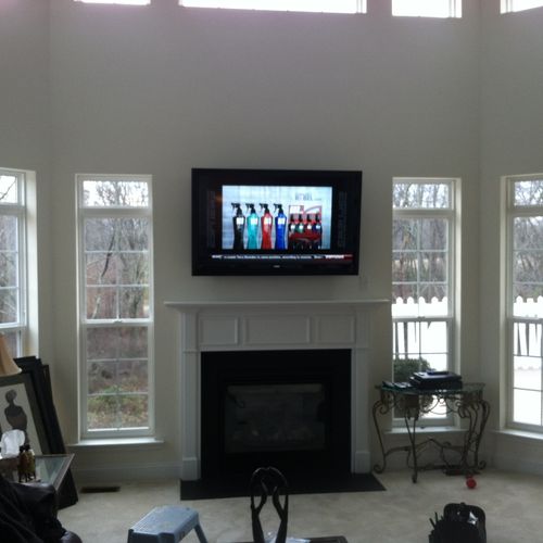 55" television over fireplace all components hidde