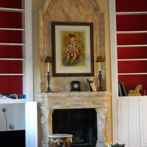 Faux marble look on this cast stone fireplace.