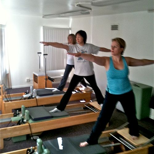 Standing Side Splits variations during a Pilates g
