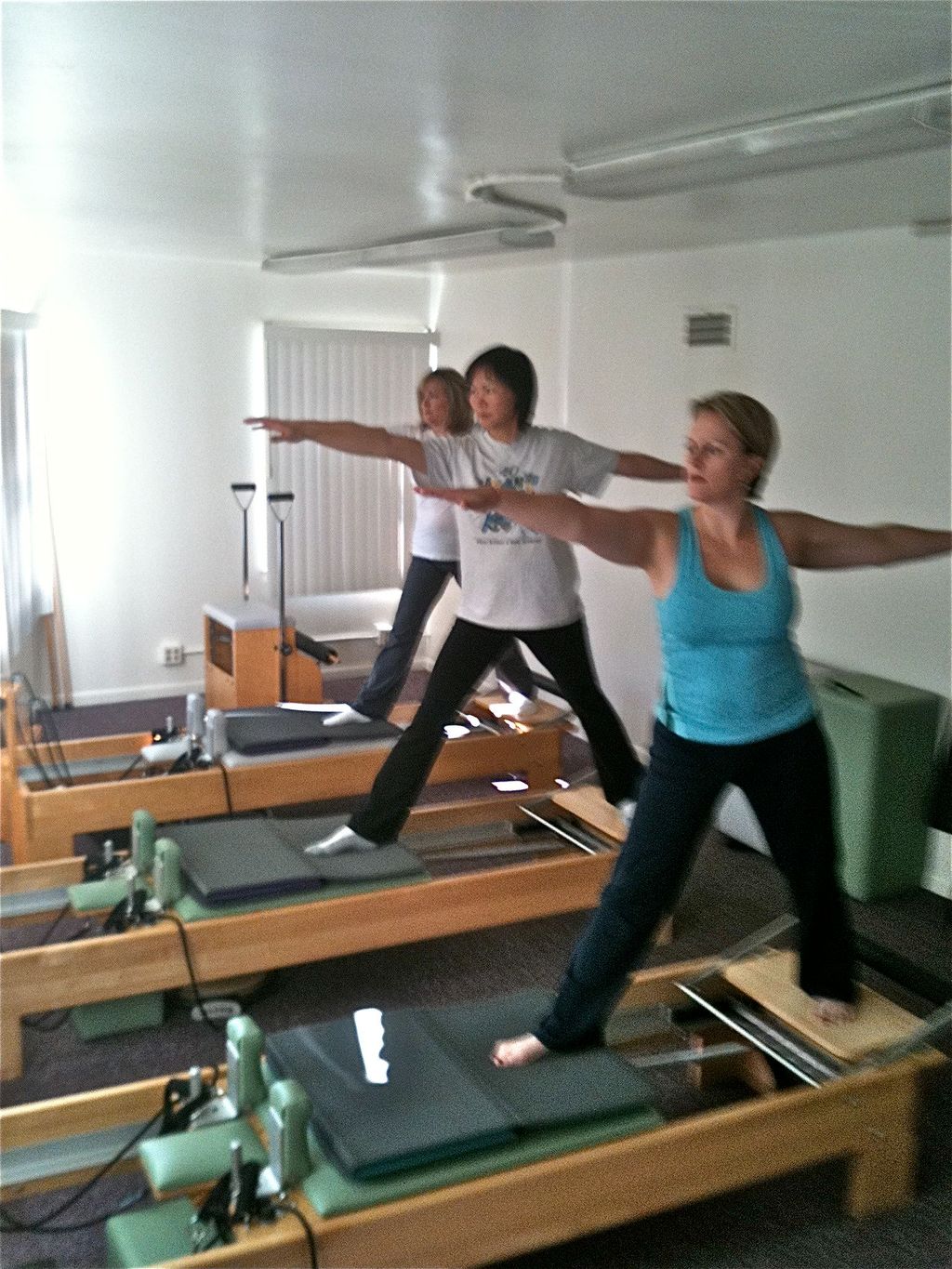 Standing Side Splits variations during a Pilates g