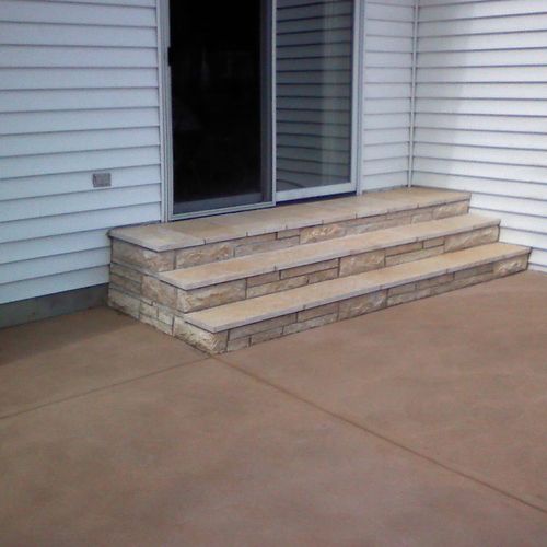 Stone steps and colored concrete patio