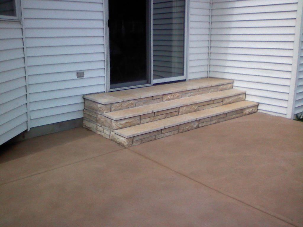 Stone steps and colored concrete patio