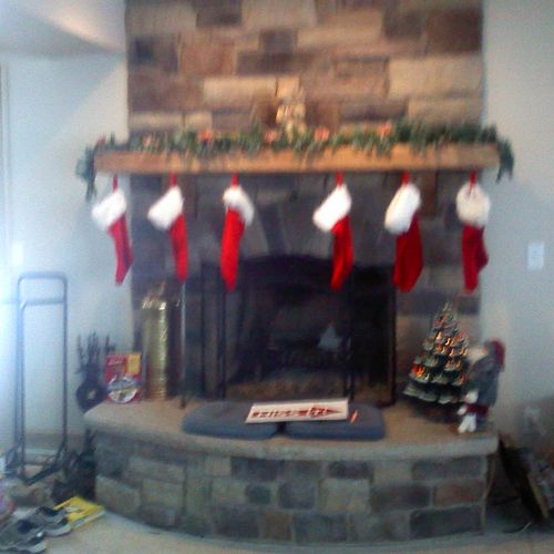 Interior cultured stone fireplace front
