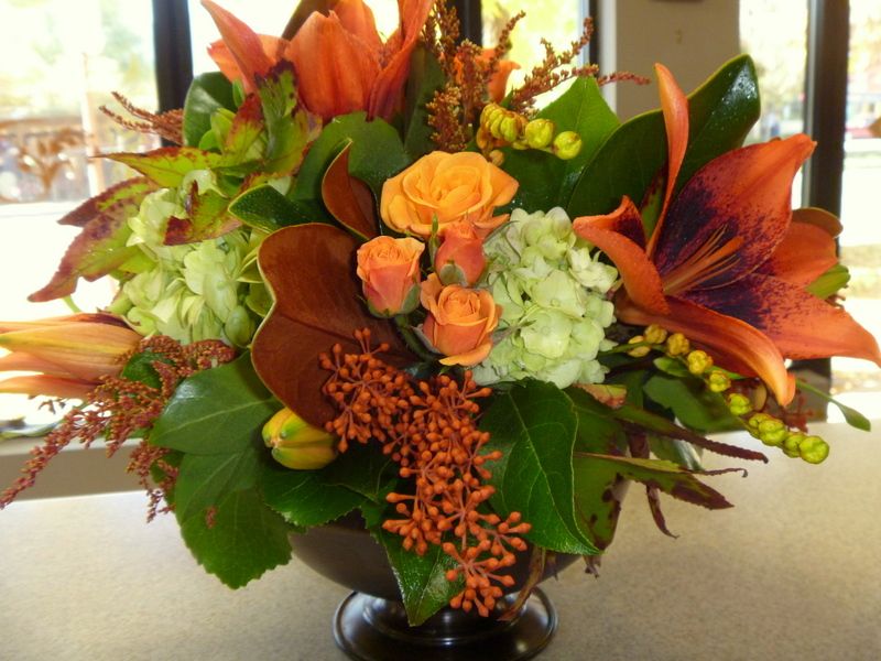Fall-themed centerpieces used at a corporate event