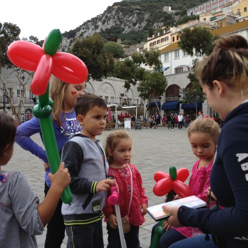 Face painting and balloon twisting in Gibraltar, E
