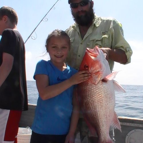 A big red snapper caught on 15lb test by a tough l