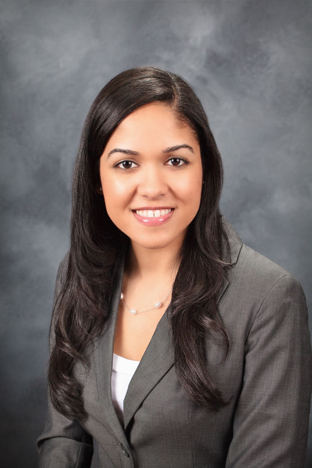 Erlina Encarnacion, Esq. is an associate as The Si